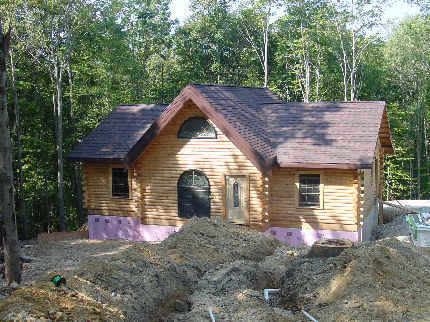 Roof_on_Utlities dug.JPG (79939 bytes)